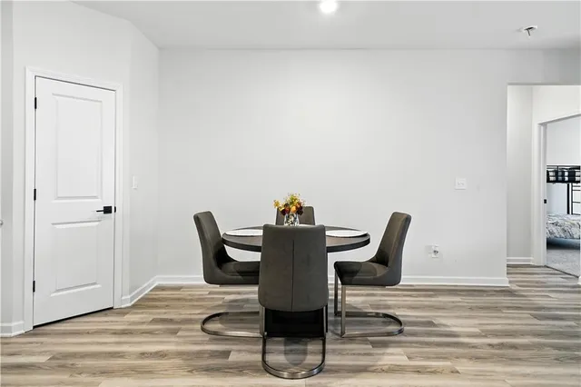 a workspace with furniture and wooden floor
