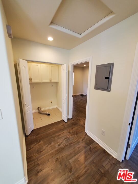 2227 Hauser Boulevard Los Angeles, CA 90016 - Photo 14 of 27 a view of a hallway with wooden floor and a bathroom