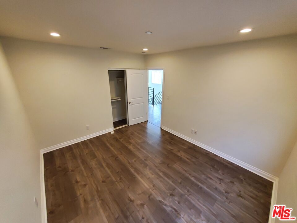 2227 Hauser Boulevard Los Angeles, CA 90016 - Photo 16 of 27 a view of a livingroom with wooden floor