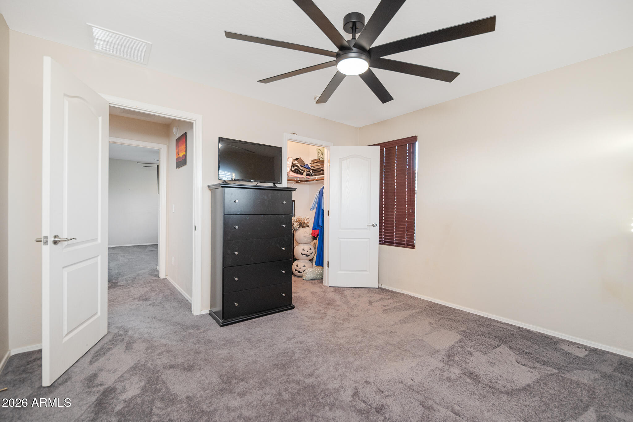 22178 West Moonlight Path Buckeye, AZ 85326 - Photo 40 of 65 Bedroom 4 Walk-In Closet