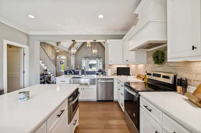 a bedroom with a bed and a mirror