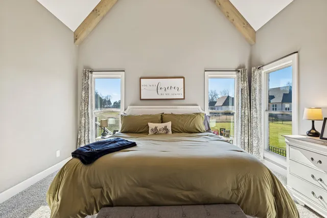 a bathroom with a sink toilet and a mirror
