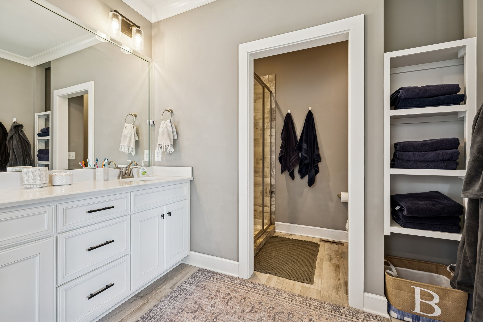 301 Timber Lane Lebanon, TN 37087 - Photo 35 of 74 a en suite bathroom with a granite countertop sink and a mirror
