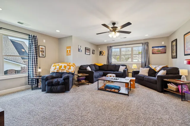an aerial view of a house with a big yard