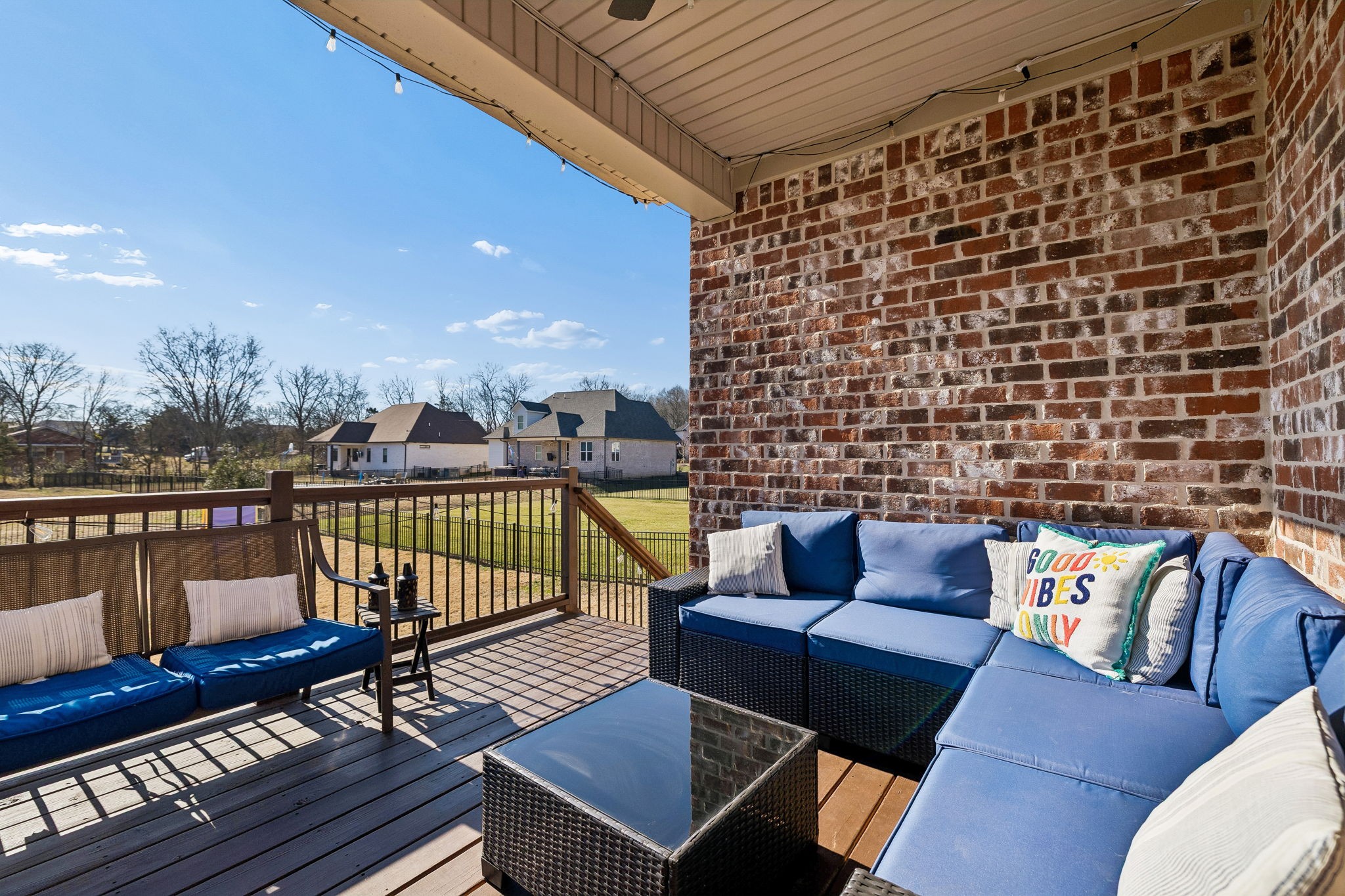 301 Timber Lane Lebanon, TN 37087 - Photo 47 of 74 a balcony with wooden floor outdoor seating and city view