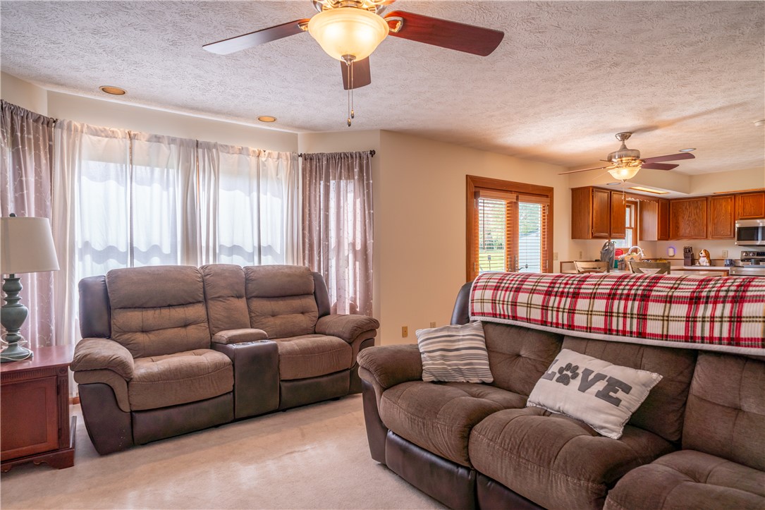 3628 Petre Road Springfield, OH 45502 - Photo 4 of 52 This inviting living space features an open concept layout, perfect for casual gatherings.