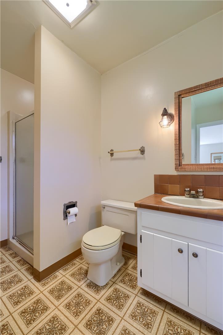 Coldsprings Rd Union Pottstown, PA 19465 - Photo 65 of 71 Functional full bathroom featuring a stand-up shower and practical vanity with tile flooring.