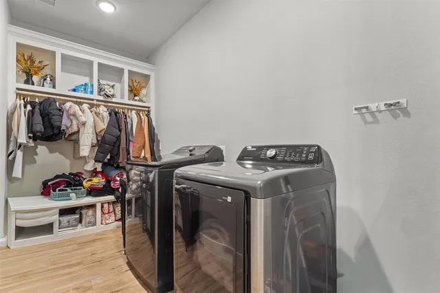 a utility room with dryer and washer
