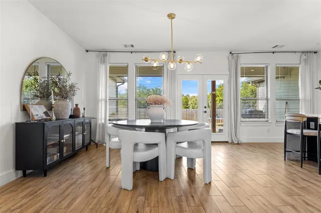 a view of a kitchen and dining room