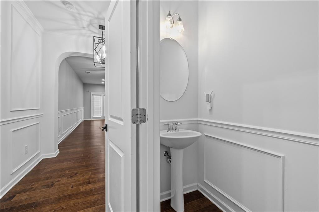 5038 Longview Walk Decatur, GA 30035 - Photo 12 of 25 a bathroom with a sink and mirror