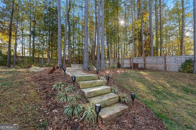 a view of a house with a swimming pool