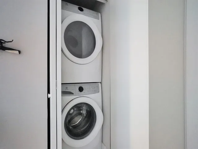 a utility room with dryer and washer
