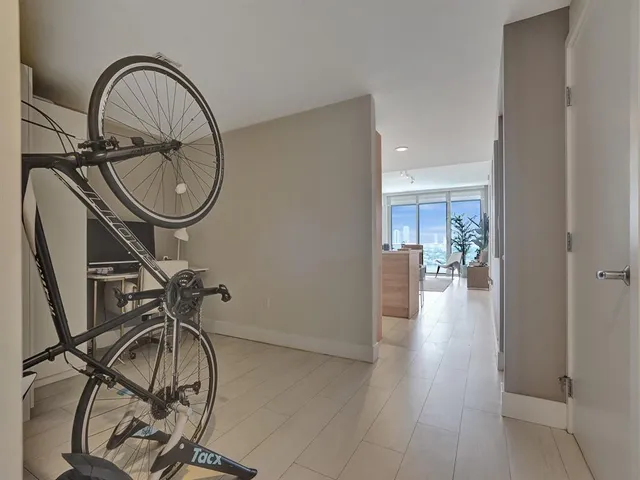 a view of an entryway with wooden floor