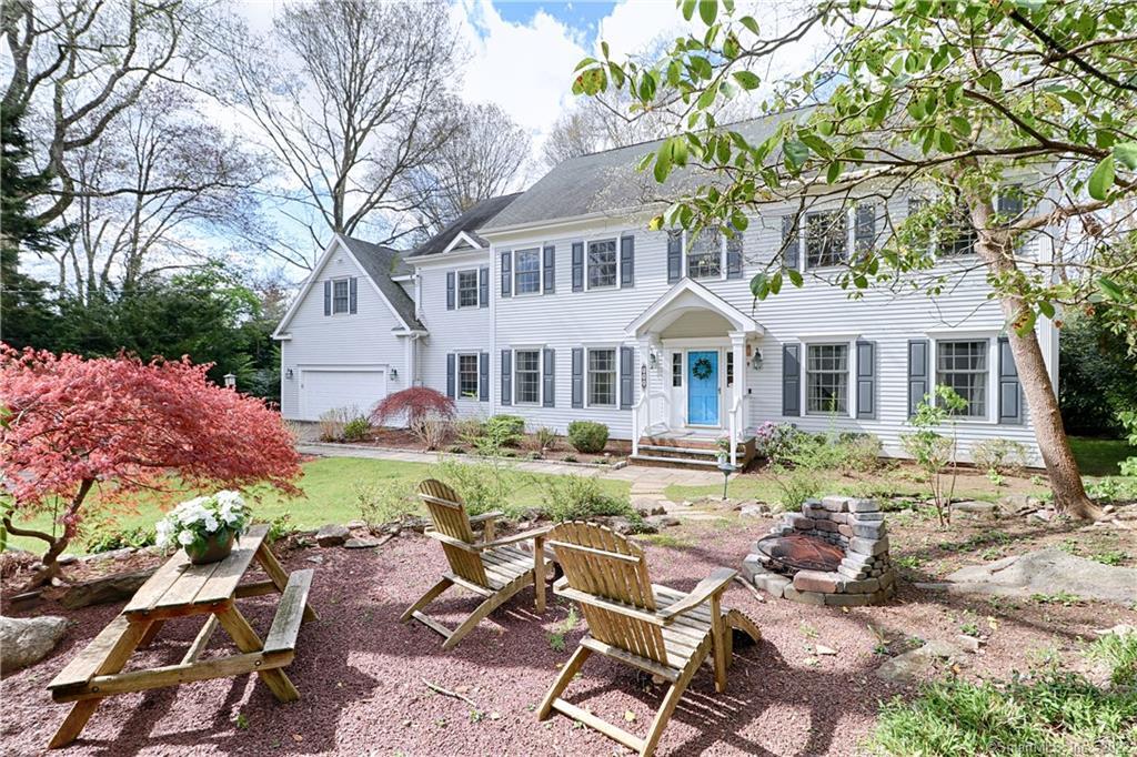 392 Old Oaks Road Fairfield, CT 06825 - Photo 1 of 1 Front view of home with fire pit area.