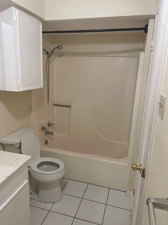 138 B Summer Place Huntsville, TX 77340 - Photo 12 of 17 a bathroom with a toilet and a shower