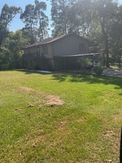 138 B Summer Place Huntsville, TX 77340 - Photo 17 of 17 a view of a backyard