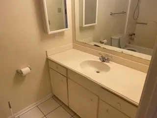 a bathroom with a toilet and a sink