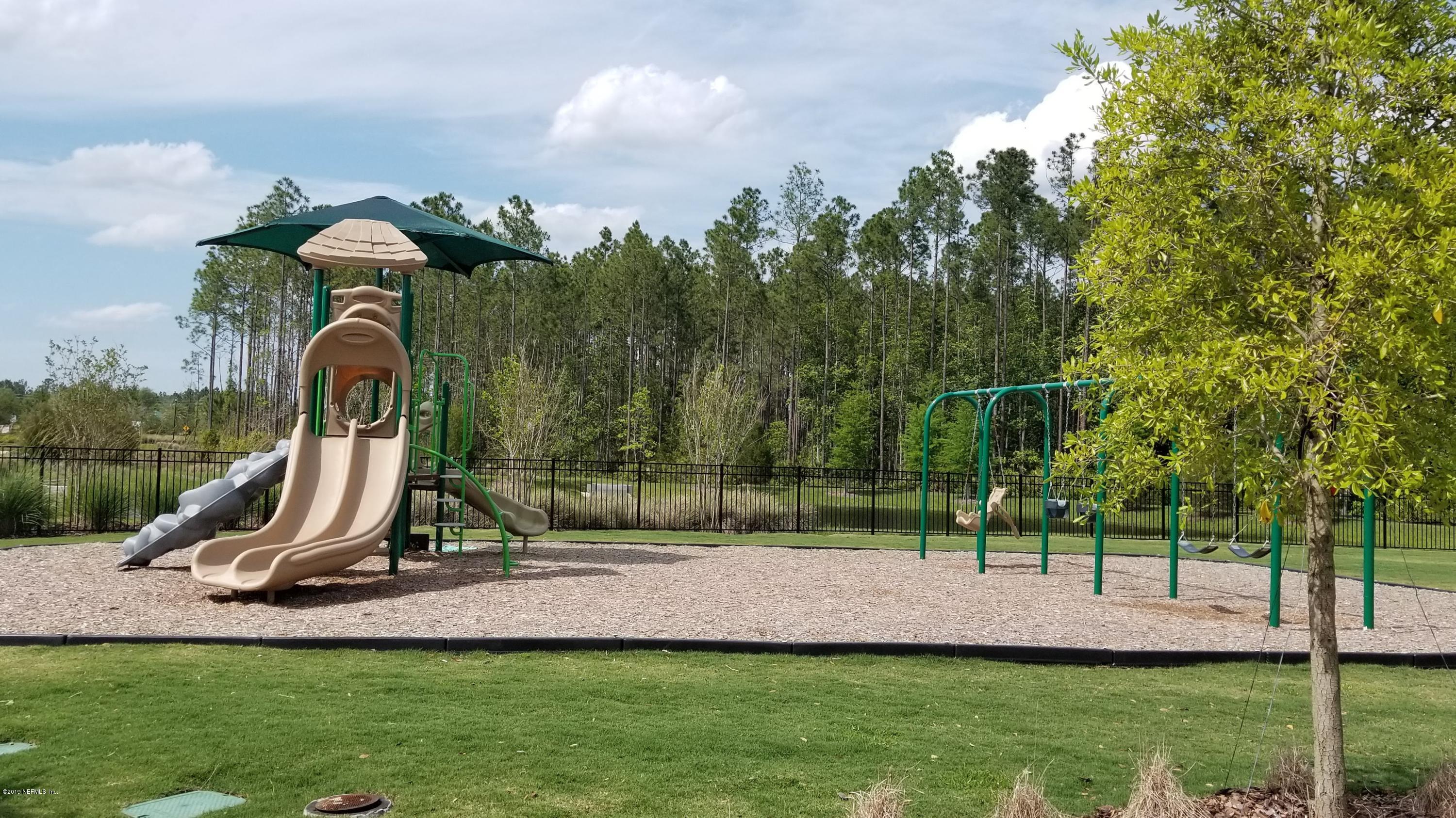 684 Broomsedge Circle St. Augustine, FL 32095 - Photo 7 of 7 a park view with a entertaining space