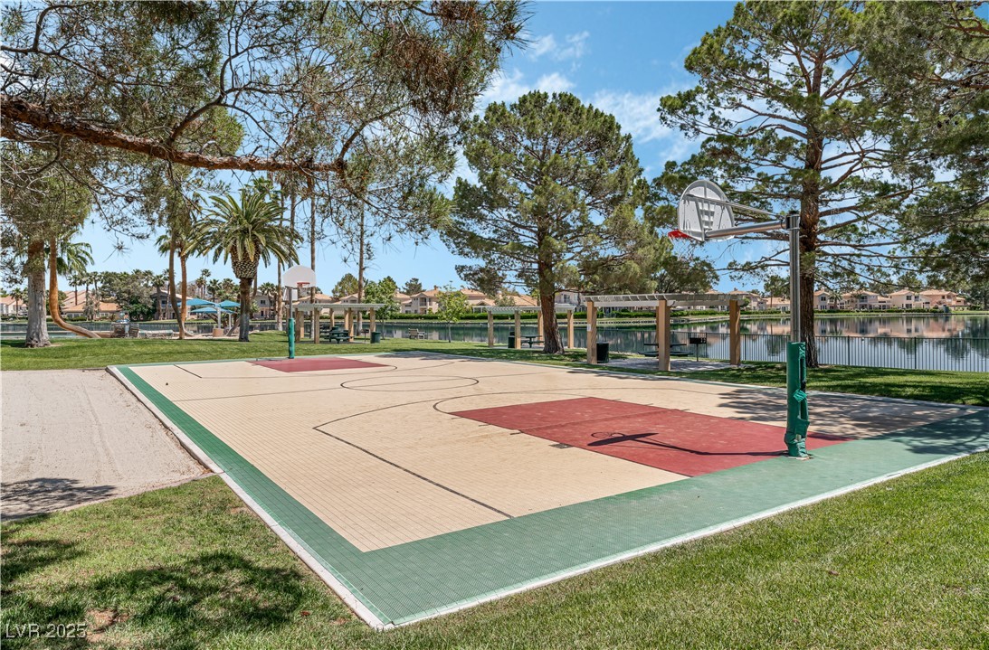 3151 North Soaring Gulls Drive, Unit 1083 Las Vegas, NV 89128 - Photo 37 of 45 View of sport court featuring community basketball court and a water view