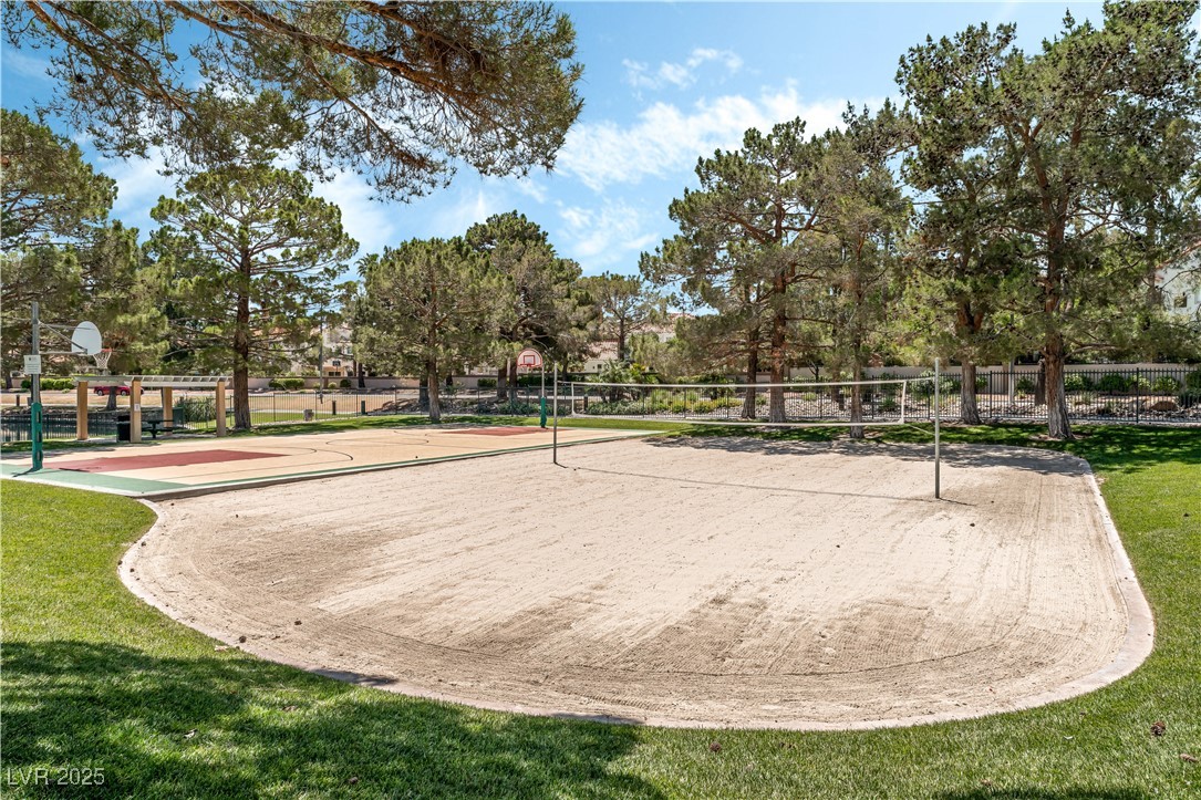 3151 North Soaring Gulls Drive, Unit 1083 Las Vegas, NV 89128 - Photo 40 of 45 View of home's community with a lawn, volleyball court, and community basketball court