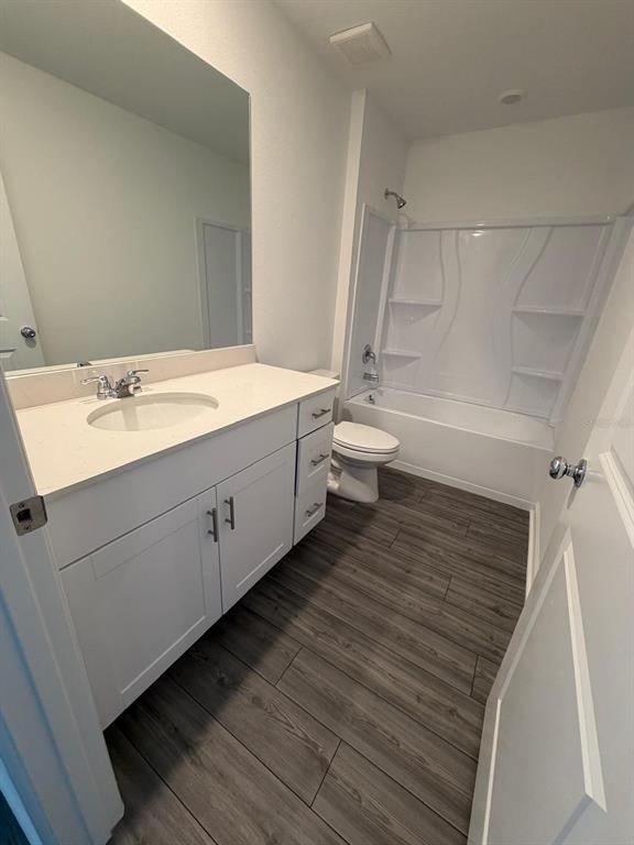 4741 Southwest 83rd Loop Ocala, FL 34476 - Photo 13 of 25 a bathroom with a sink and a mirror