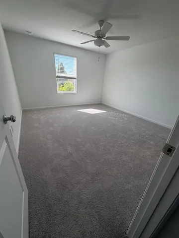 a view of a livingroom with a window