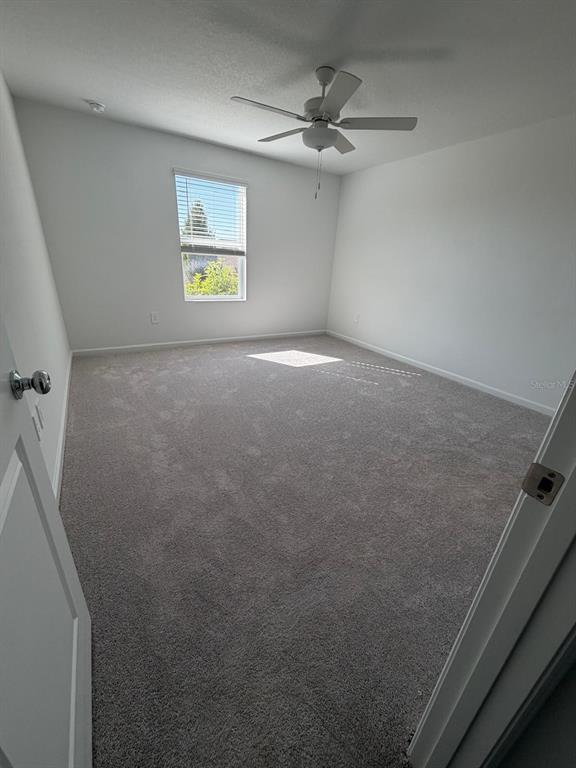 4741 Southwest 83rd Loop Ocala, FL 34476 - Photo 14 of 25 a view of a livingroom with a window