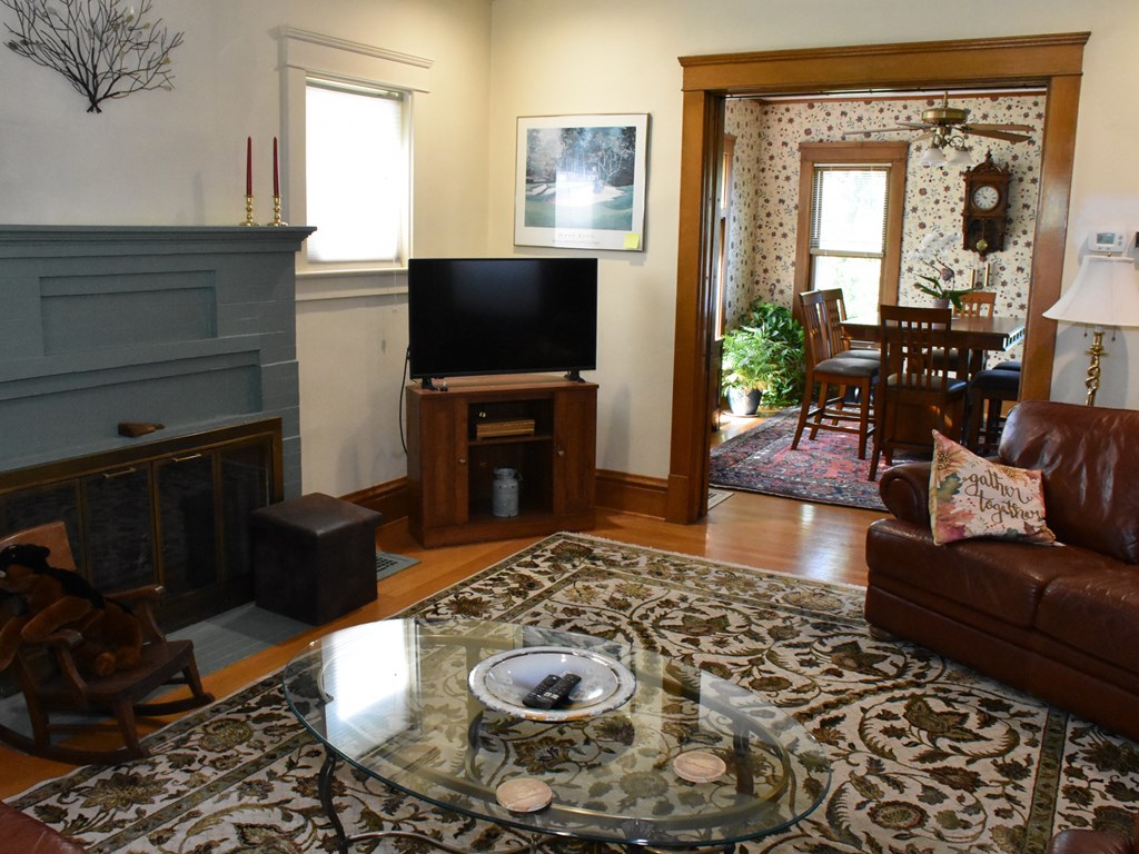 655 Chestnut Street Meadville, PA 16335 - Photo 9 of 43 a living room with furniture and a fireplace
