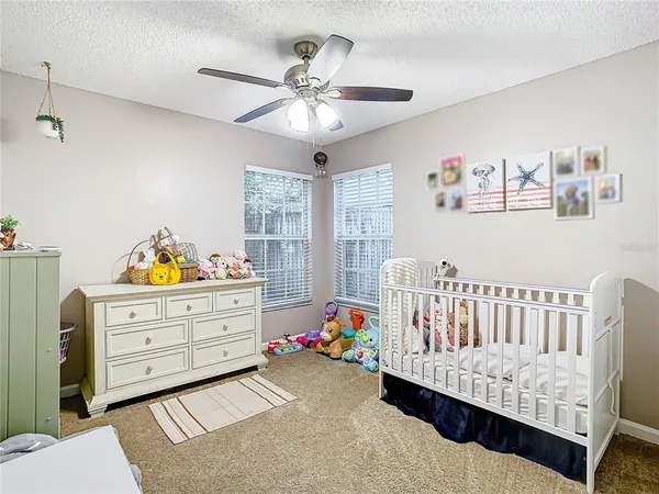 a bedroom with furniture and a bed