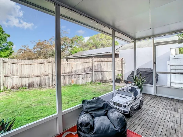 a view of backyard with green space