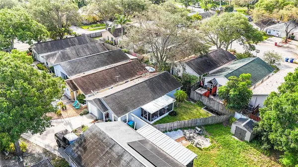 an aerial view of a house with a garden