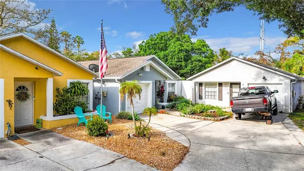a view of a house with outdoor space and porch