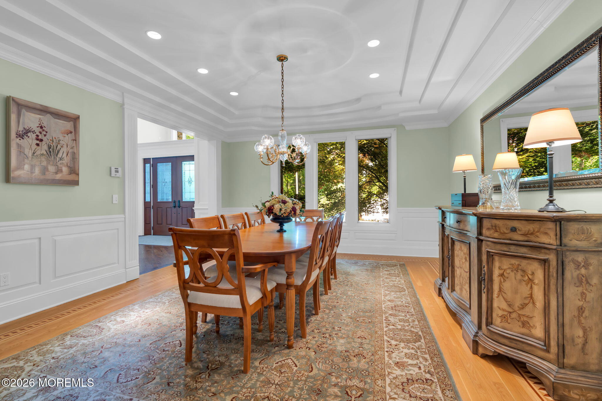 672 Winding River Road Brick, NJ 08724 - Photo 17 of 111 a dining room with furniture a chandelier and wooden floor