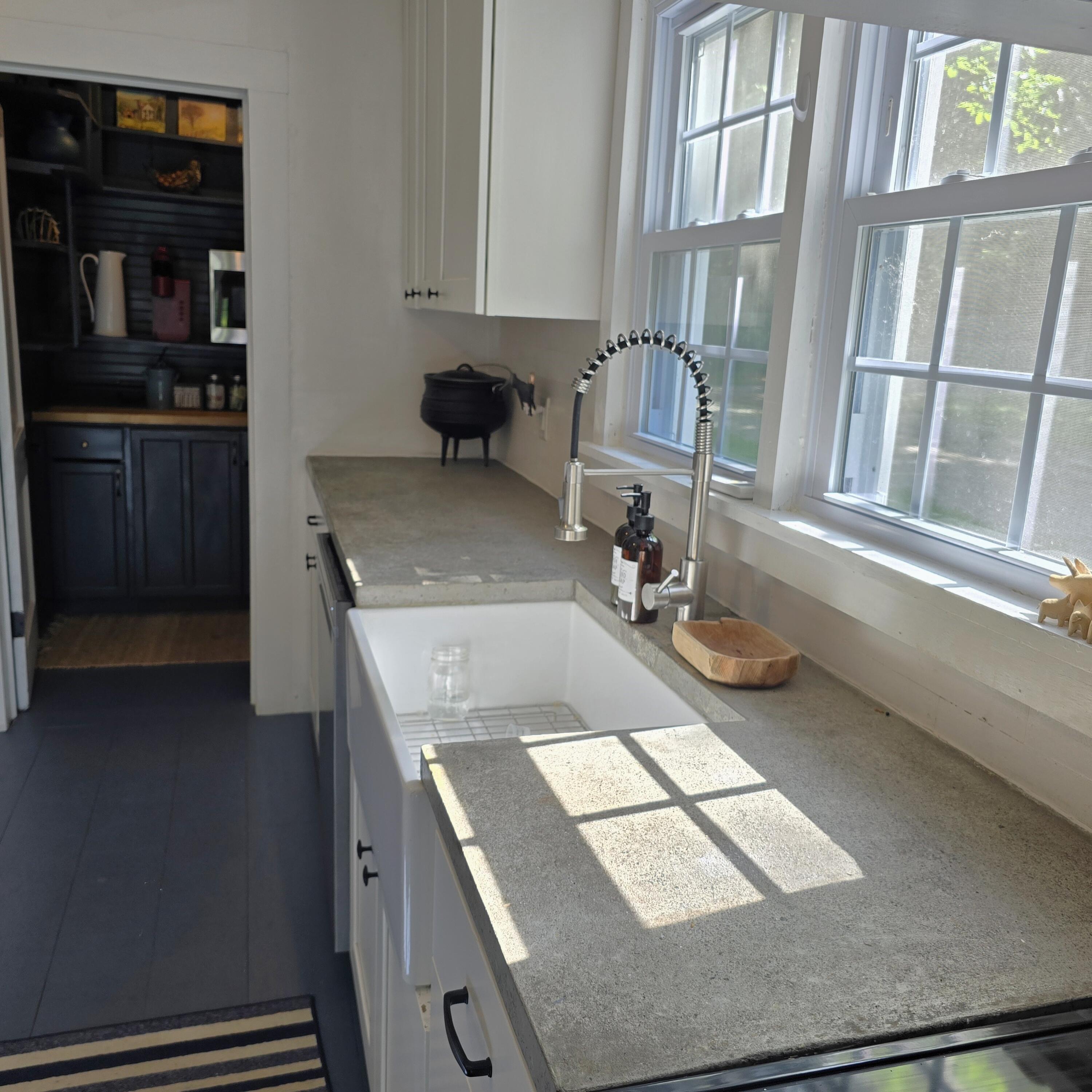 3542 Persimmon Road Shawsville, VA 24162 - Photo 31 of 94 a kitchen with a sink and a stove top oven