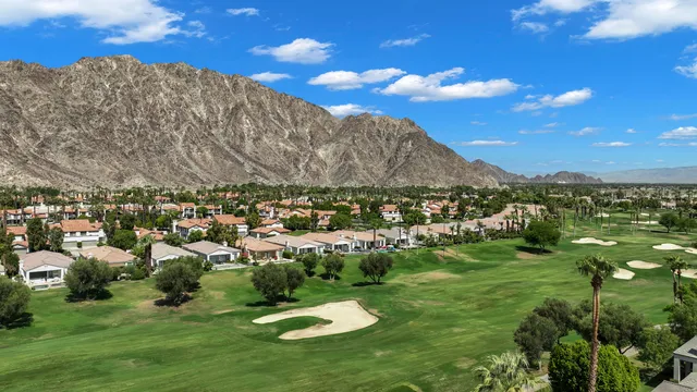 a view of a city with a lake