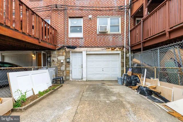 a view of a house with large windows