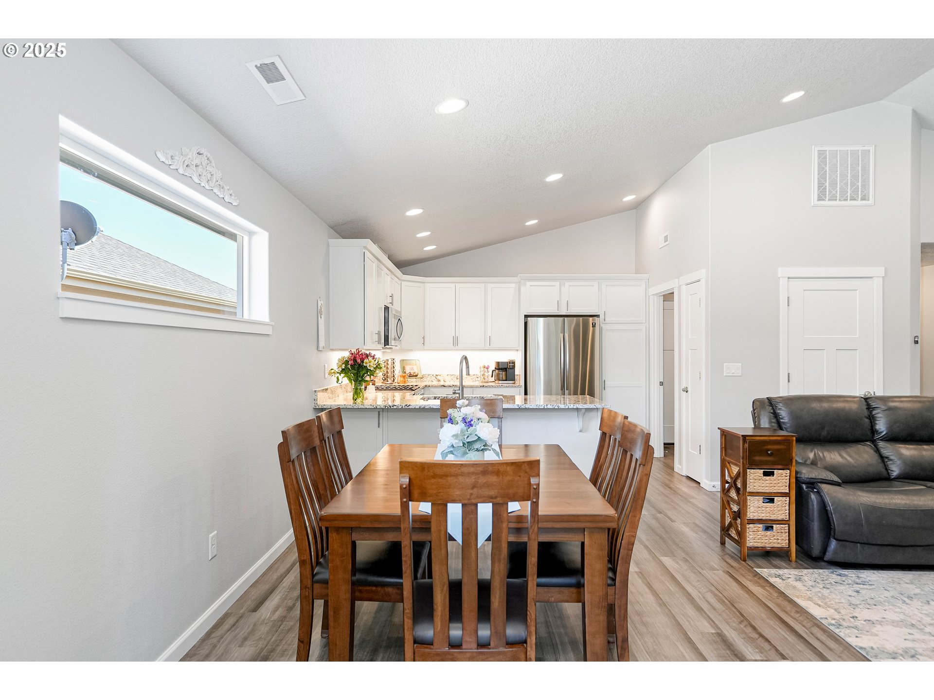 2054 Southeast Academy Street Dallas, OR 97338 - Photo 13 of 26 a view of a dining room with furniture