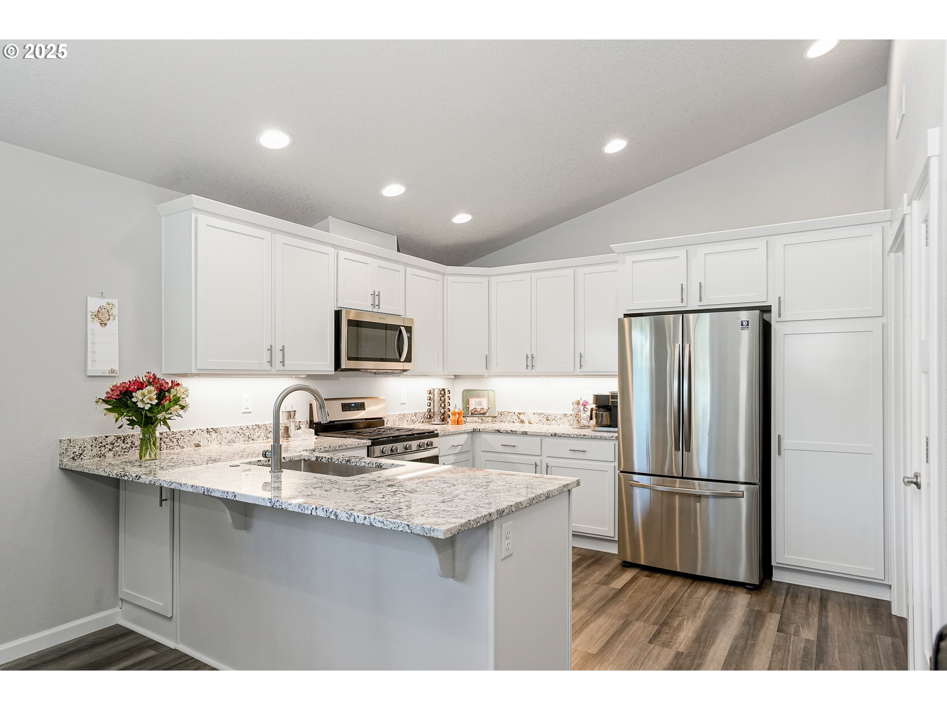 2054 Southeast Academy Street Dallas, OR 97338 - Photo 7 of 26 a kitchen with refrigerator and a sink