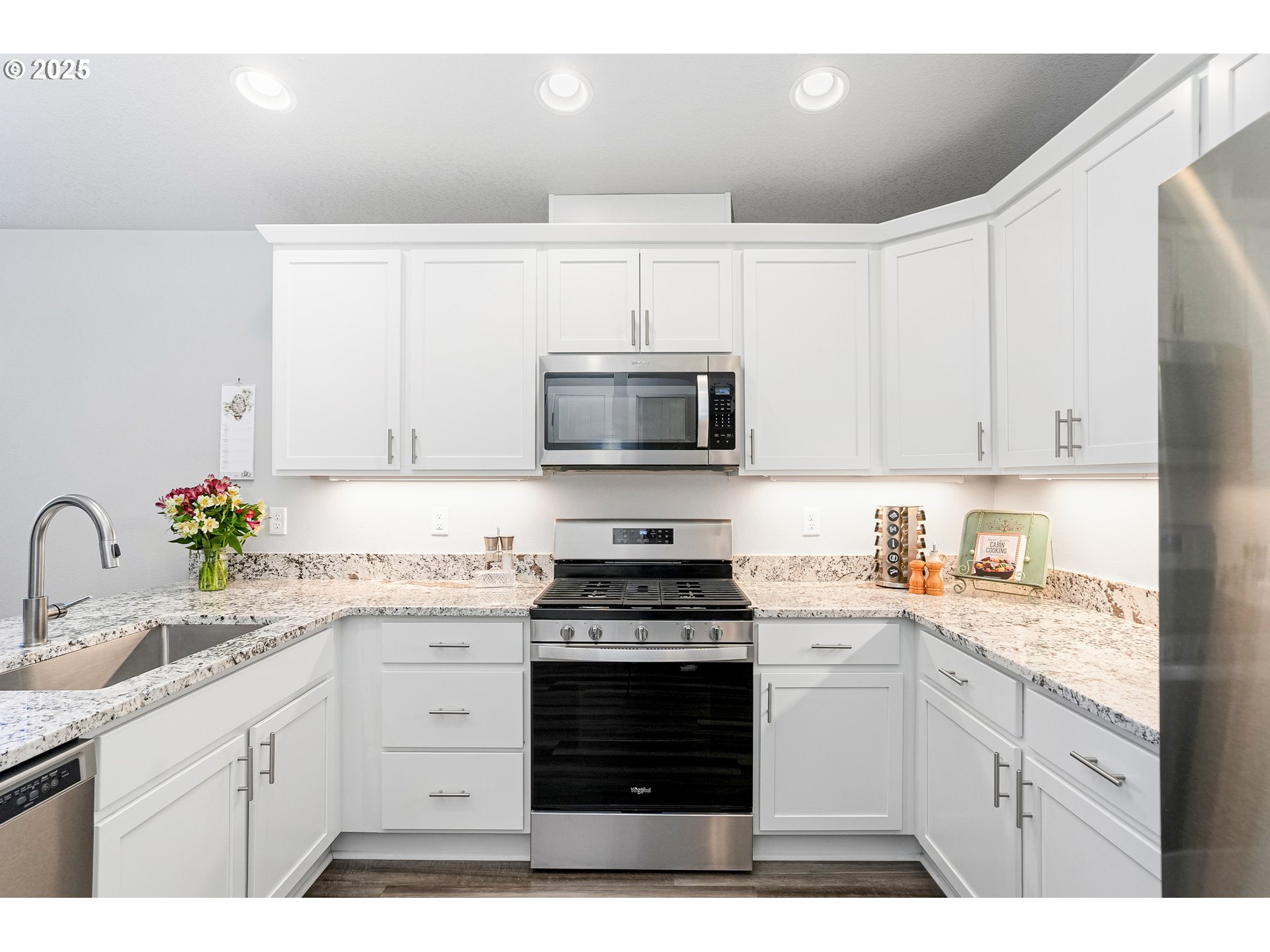2054 Southeast Academy Street Dallas, OR 97338 - Photo 9 of 26 a kitchen with granite countertop a stove sink and microwave