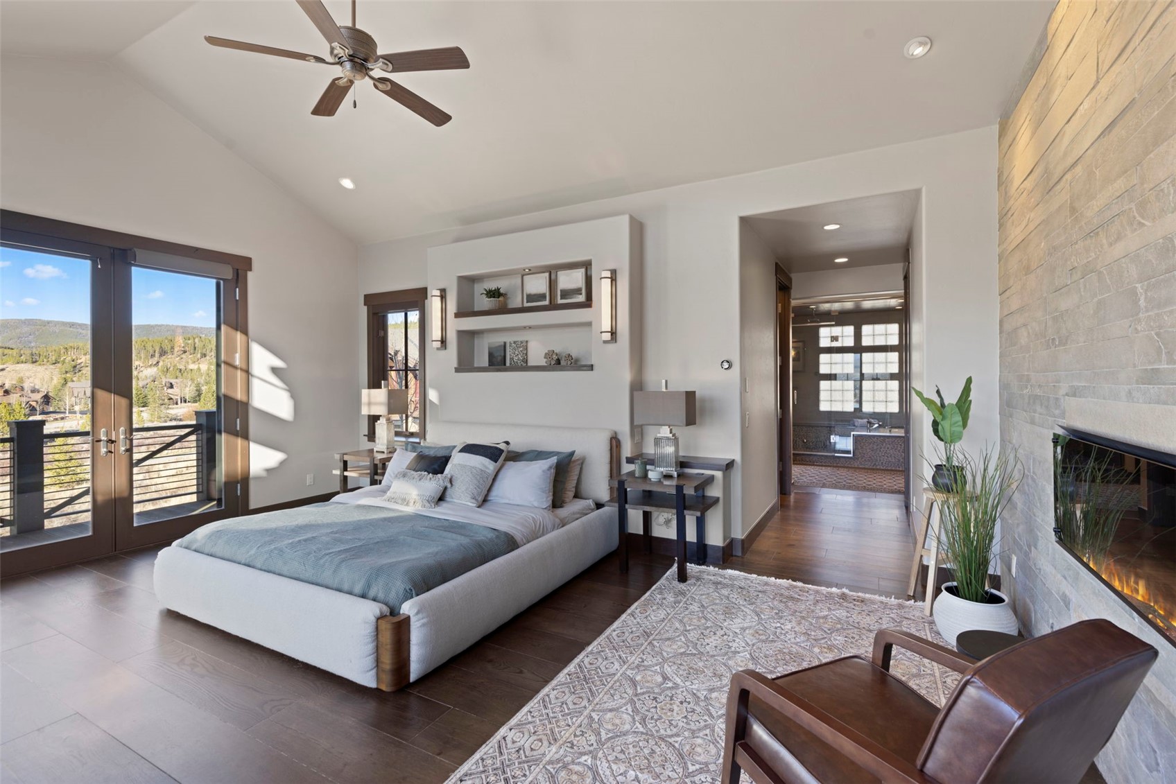 436 Gold Run Road Breckenridge, CO 80424 - Photo 20 of 50 Linear gas fireplace (serviced recently) with stone accent wall setting the mood for this stunning room.