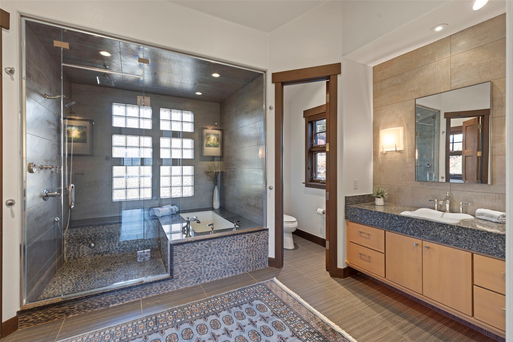 436 Gold Run Road Breckenridge, CO 80424 - Photo 24 of 50 The perfect primary bathroom! Two separate closed off toilets, two separate sinks, steam shower AND tub.
