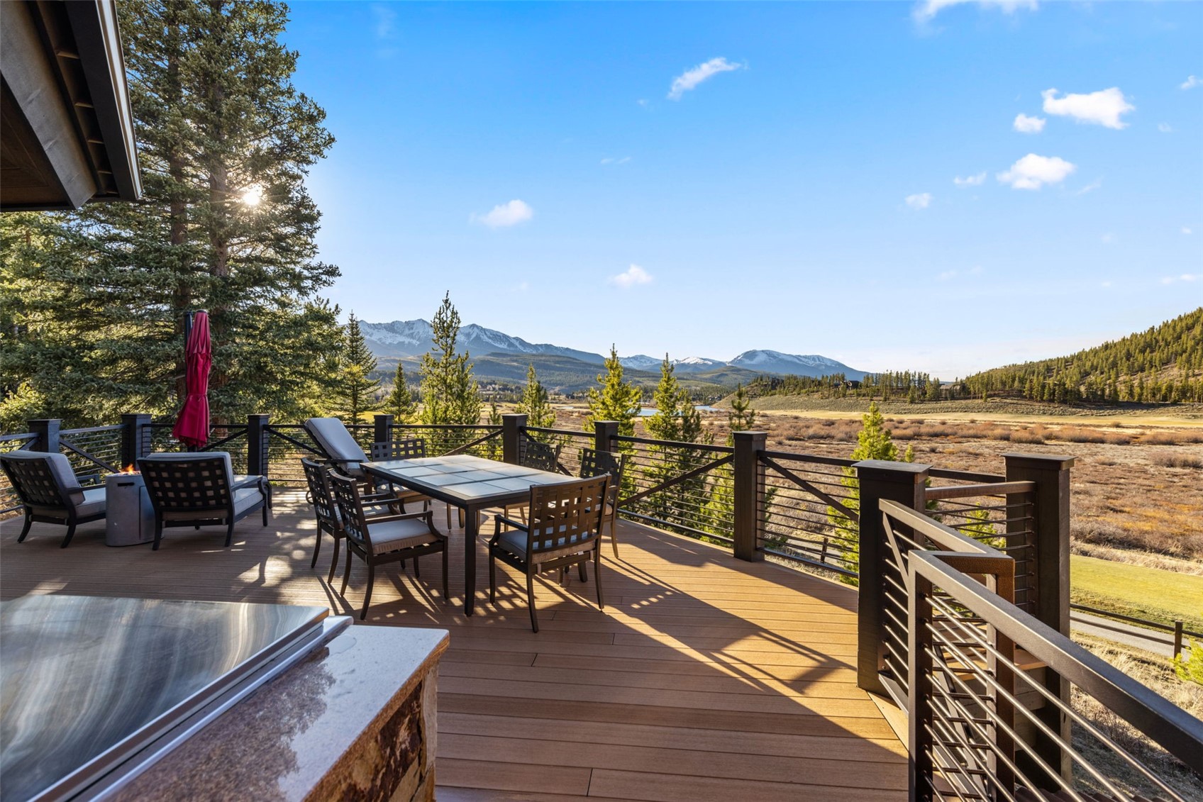 436 Gold Run Road Breckenridge, CO 80424 - Photo 27 of 50 Ample outdoor furniture space on this main-level deck overlooking the golf course and open space!