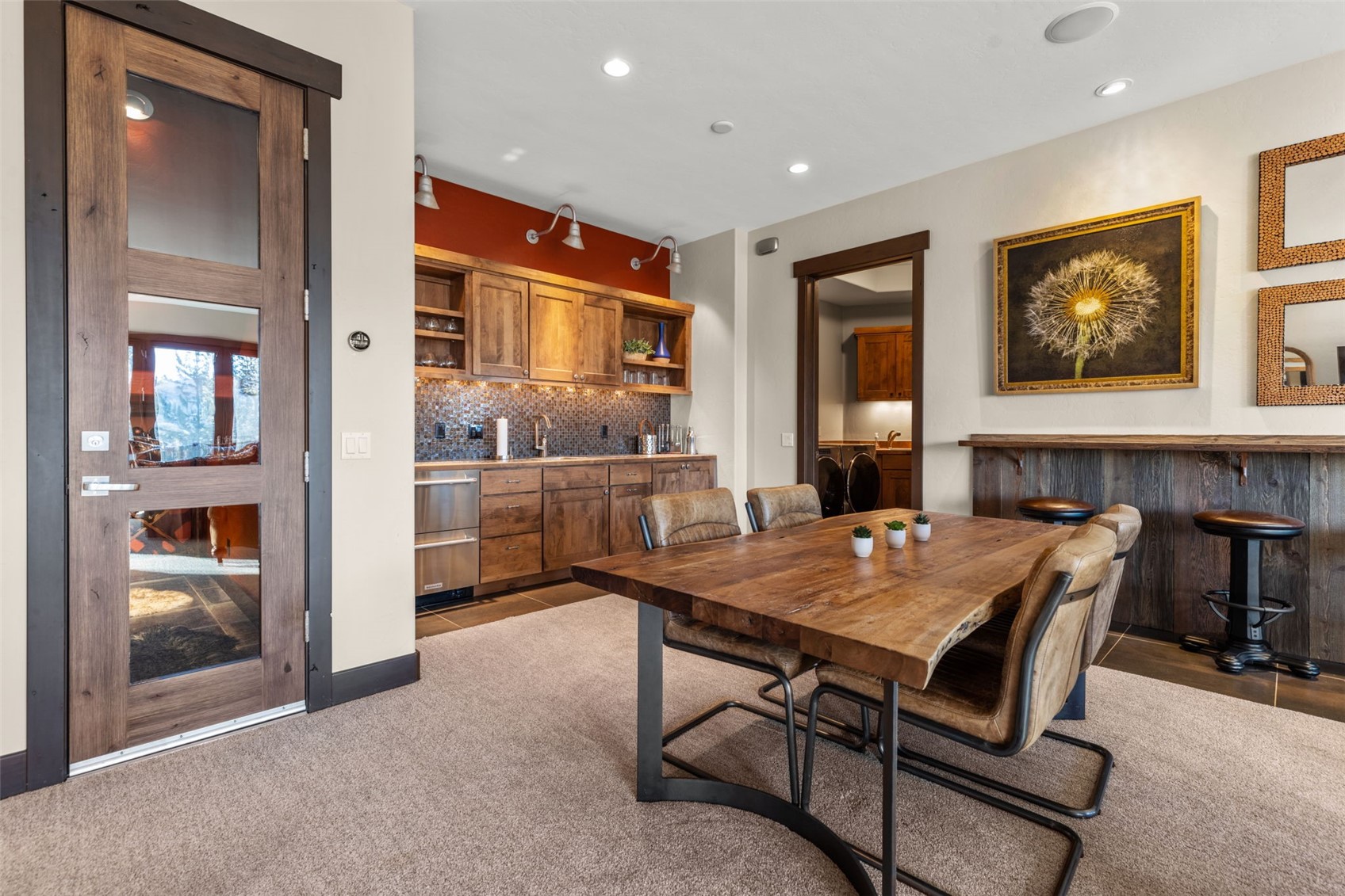 436 Gold Run Road Breckenridge, CO 80424 - Photo 34 of 50 Full wet bar featuring a small ice maker & fridge, sink, and ample cabinets.