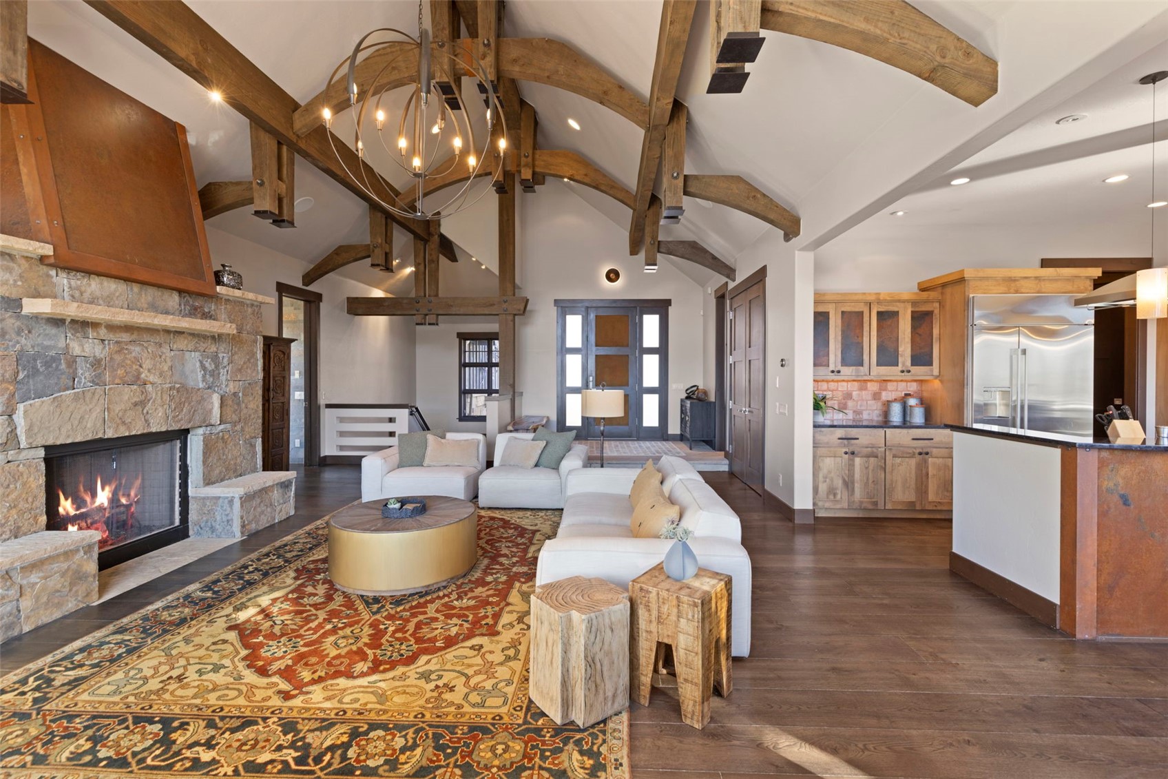 436 Gold Run Road Breckenridge, CO 80424 - Photo 7 of 50 Drystack stone fireplace with a rustic metal chimney.