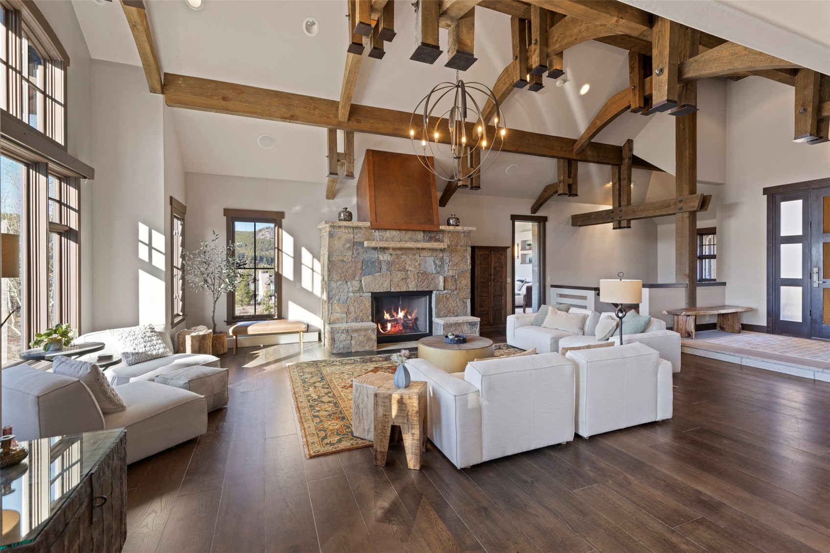 436 Gold Run Road Breckenridge, CO 80424 - Photo 8 of 50 Main-level living with garage, kitchen, Great Room, and primary bedroom all on the first floor.