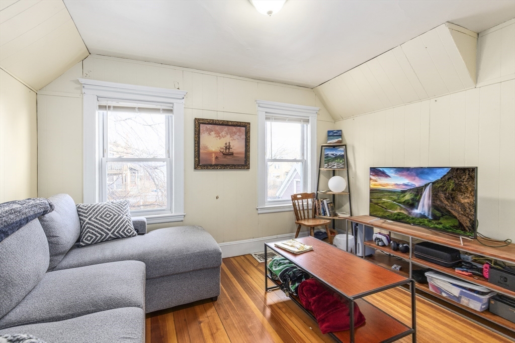 78 R Mt Vernon Street Somerville, MA 02145 - Photo 16 of 32 a living room with furniture and a flat screen tv