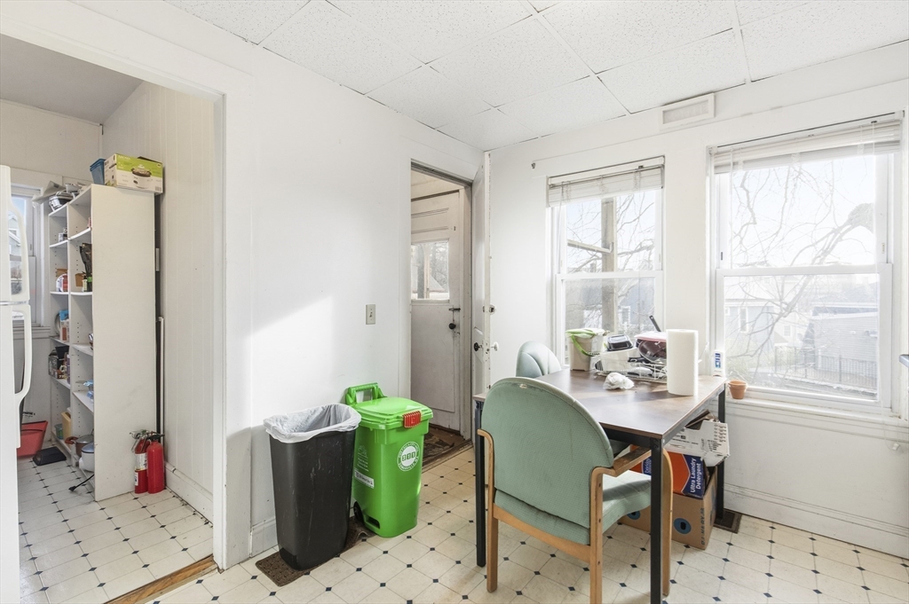 78 R Mt Vernon Street Somerville, MA 02145 - Photo 19 of 32 a view of a workspace with furniture and a window