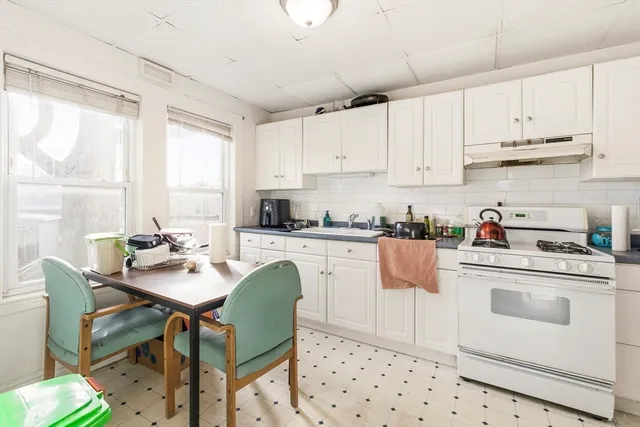 a front view of a house with a garage