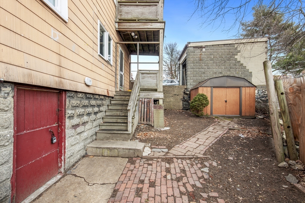 78 R Mt Vernon Street Somerville, MA 02145 - Photo 27 of 32 a front view of a house with a garage