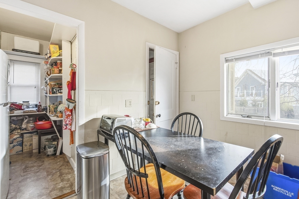 78 R Mt Vernon Street Somerville, MA 02145 - Photo 7 of 32 a view of a dining room with furniture and a window